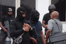Nigerian government has deployed Masked DSS to the premises of the Federal High Court, Maitama...jpg